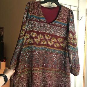 Dress. Key holes in the sleeves